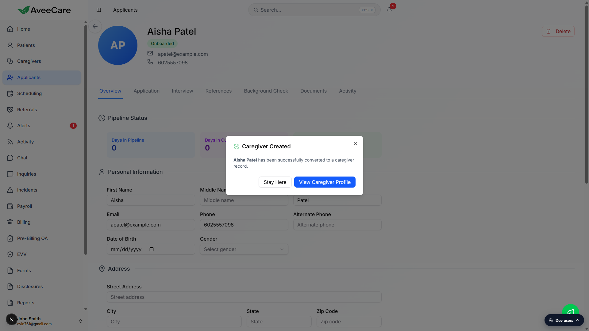 Caregiver Created success dialog confirming Aisha Patel was converted, with Stay Here and View Caregiver Profile buttons