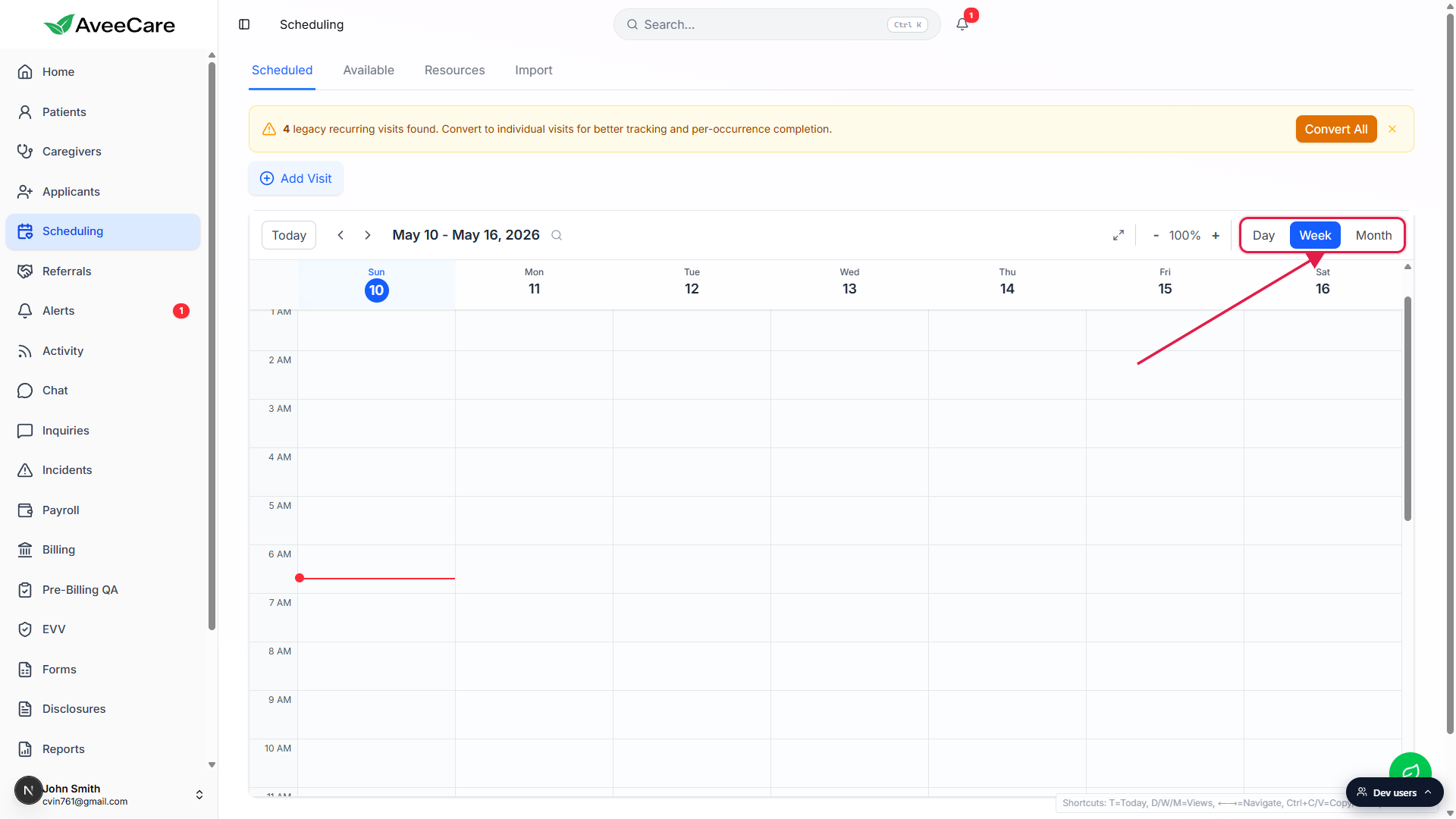 Scheduling page in Week view with the Day, Week, Month toggle in the top-right of the calendar header called out by a red box