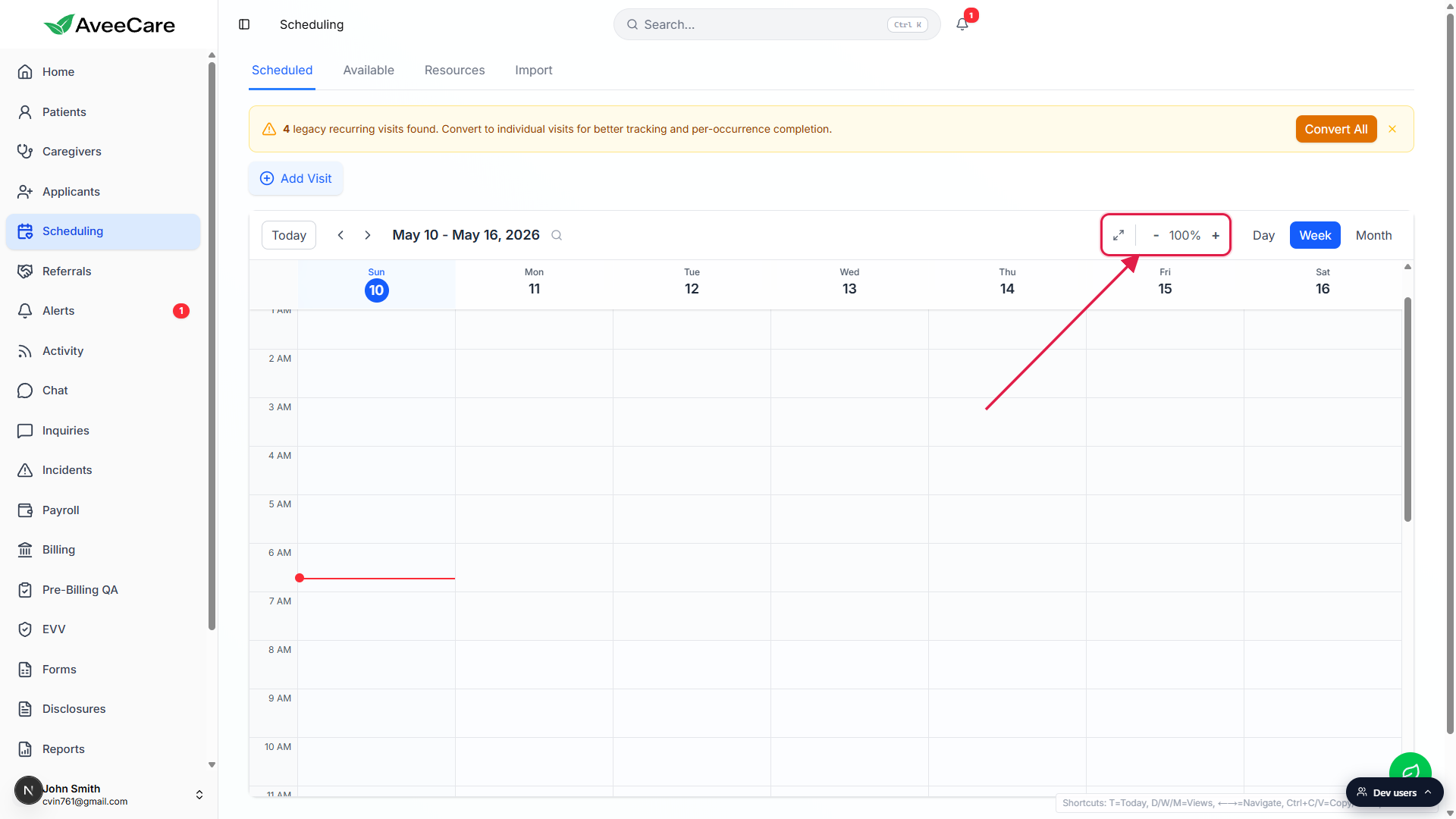 Calendar header showing the diagonal-arrows fullscreen icon and the minus, 100 percent, plus zoom cluster called out together by a red box