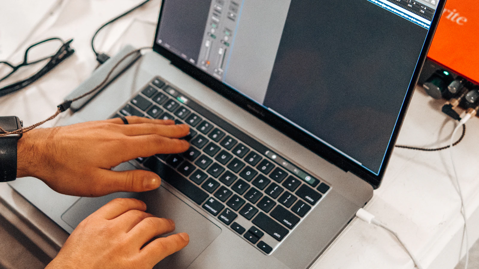 Person evaluating home care software on a laptop in a relaxed setting