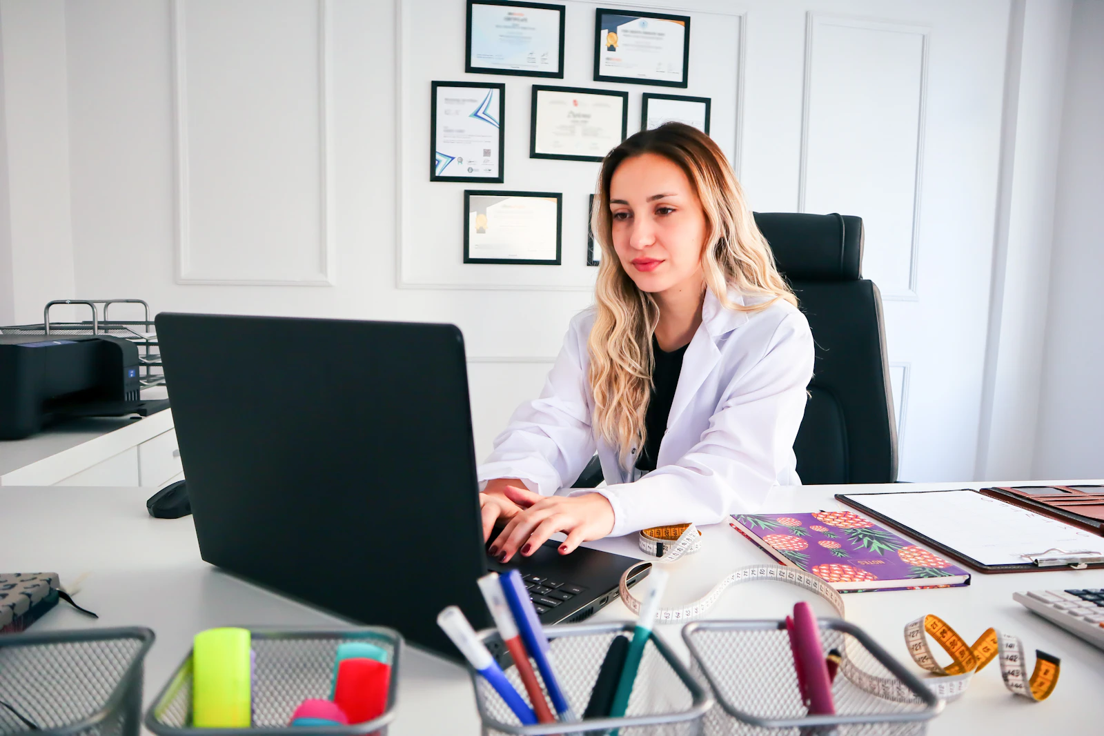 Agency owner reviewing home care software options on a laptop